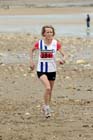 Sue Phillips (Darlington) finishing 2nd in the Pier to Pier Race, South Shields to Roker, Sunderland.
